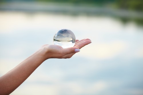 Crystal ball on hand